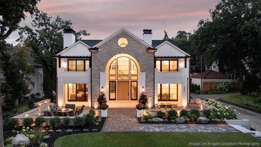 Luxury arched Minnesota lake home with marketing reports